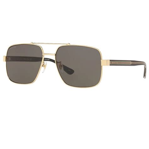 Gucci GG0529S 60 Grey & Gold Sunglasses .